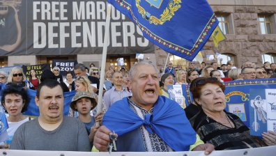 Ключове, за които няма врата: Митинг на разселени жители на Мариупол (СНИМКИ)