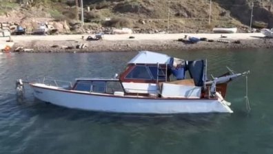 Въоръжени нападнаха лодка с либийски мигранти