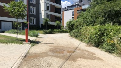 Улица в столичния кв. "Витоша" - на чакъл, без маркировка, знаци и кофи за боклук