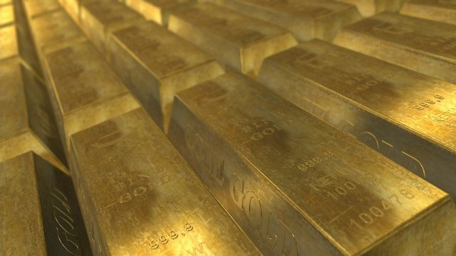 Цената на златото се срина под 1700 долара за тройунция