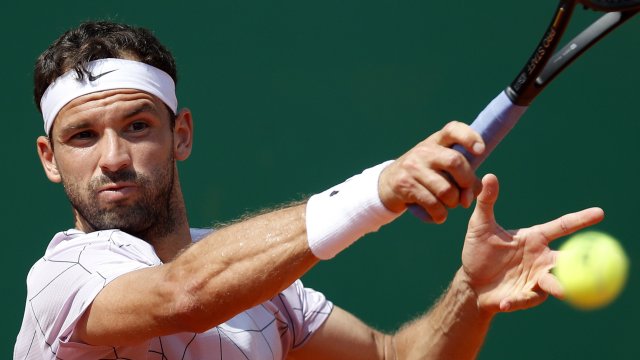 Григор Димитров и партньорът му на двойки Феликс Оже Алиасим от