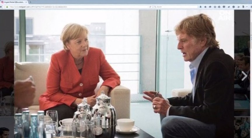 Ангела Меркел почерпи с чай актьора Робърт Редфорд
