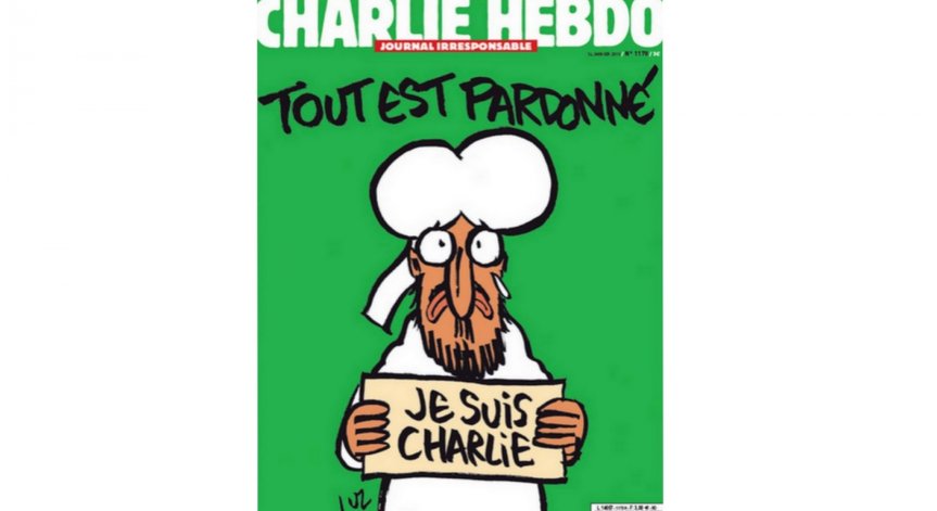 Мохамед държи лозунг 