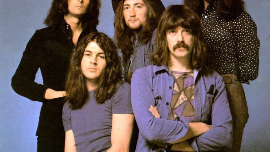 Джон Лорд (долу вдясно) като част от златната формация на Deep Purple, 1973